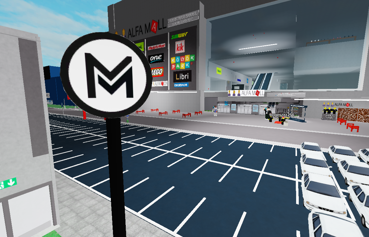 Metro sign and Alfa Mall Building